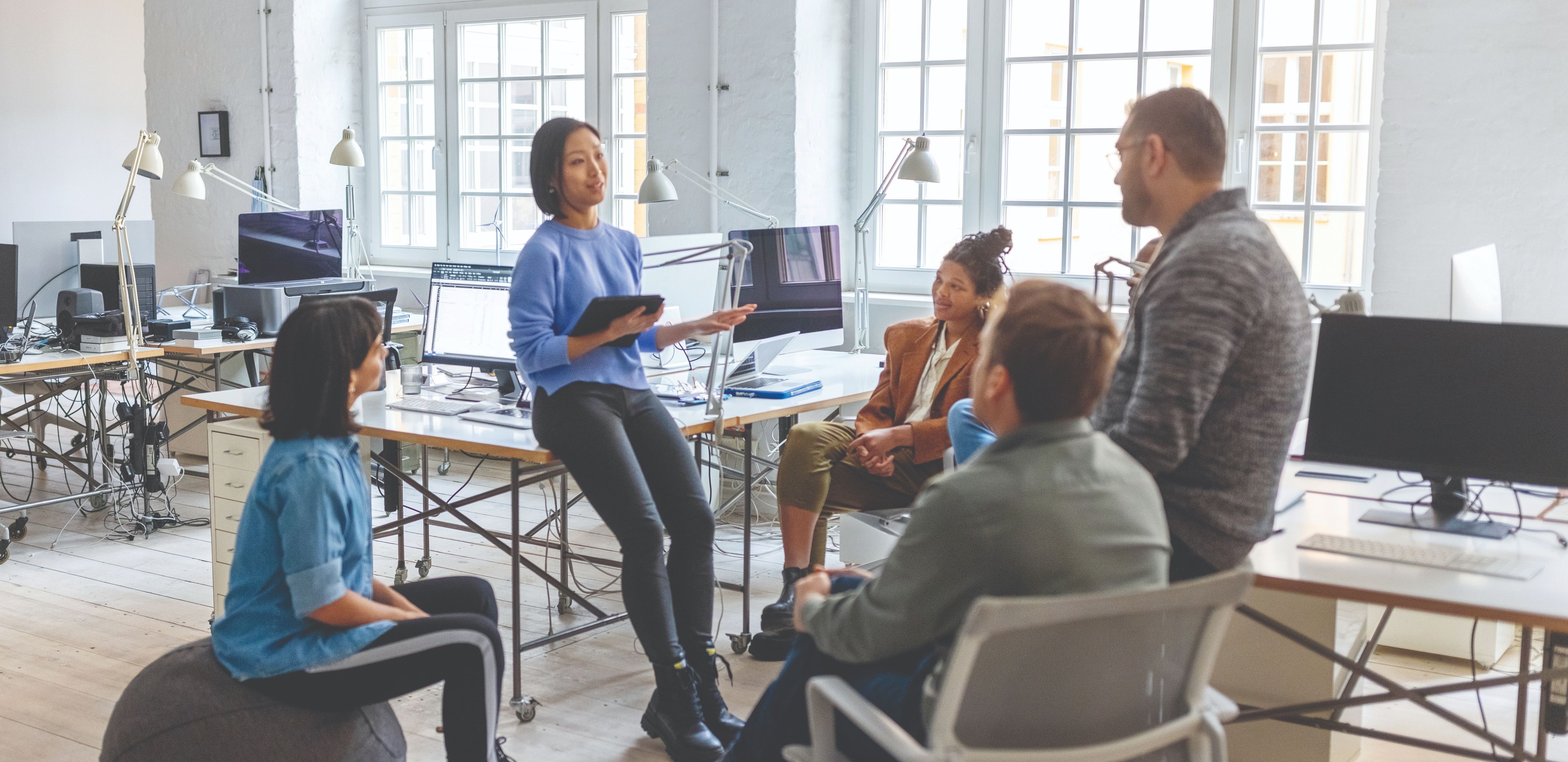 Katun employees in a meeting